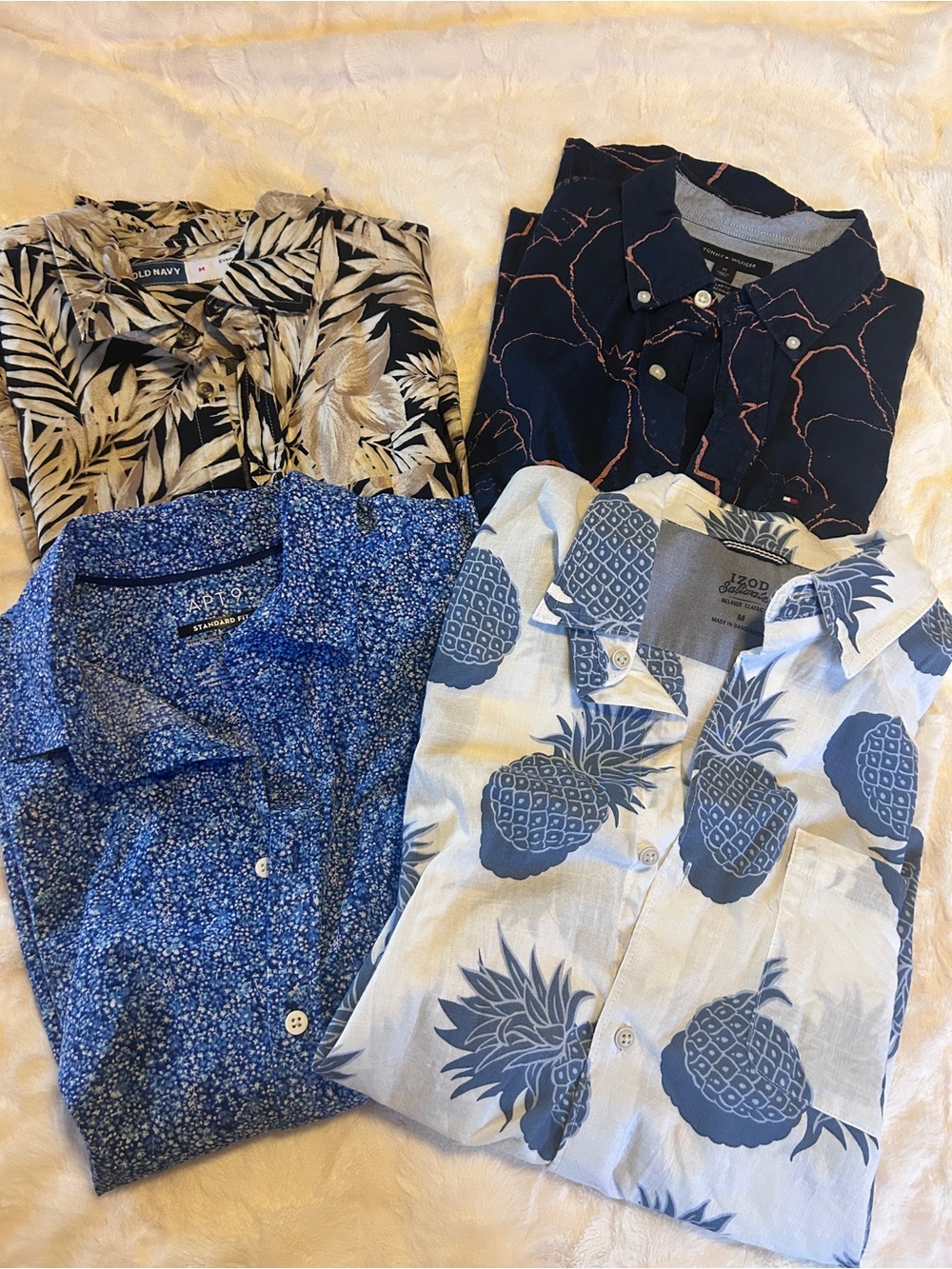 Four short sleeved button down shirts